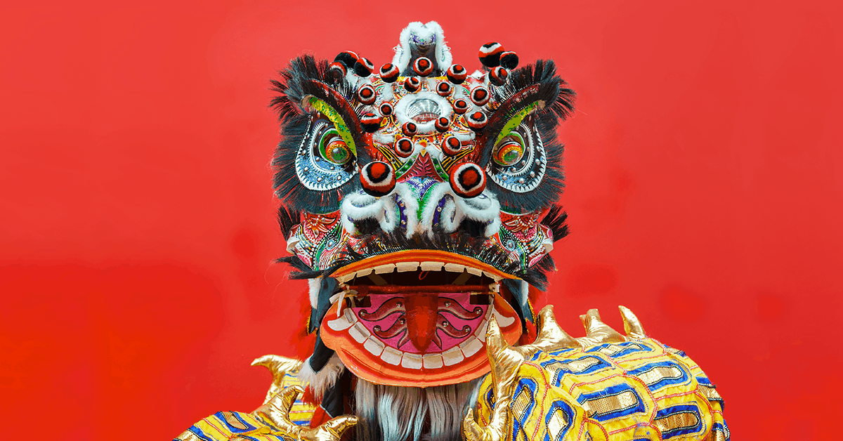 Lion dances are common sights among Lunar New Year celebrations. Image credit: LeeYiuTung/iStock