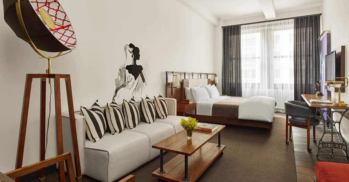 The Refinery guest rooms offer unique, artistic flair. Image credit: The Refinery Hotel.