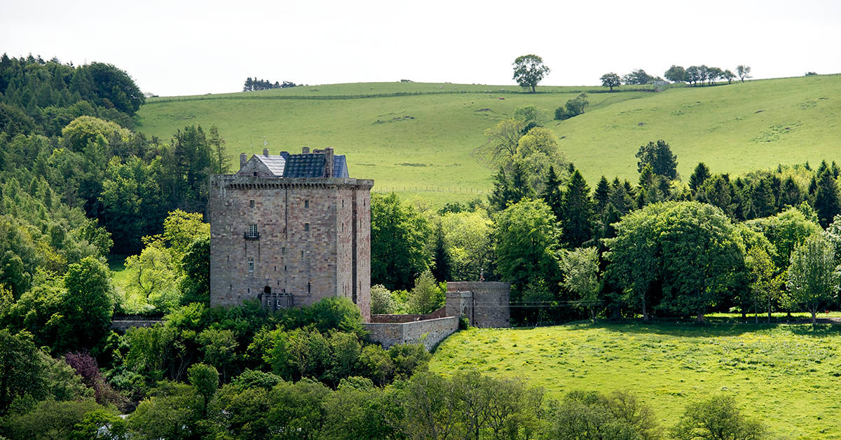 Borthwick Castle is set among the rolling hills of Scotland. Image credit: Borthwick Castle