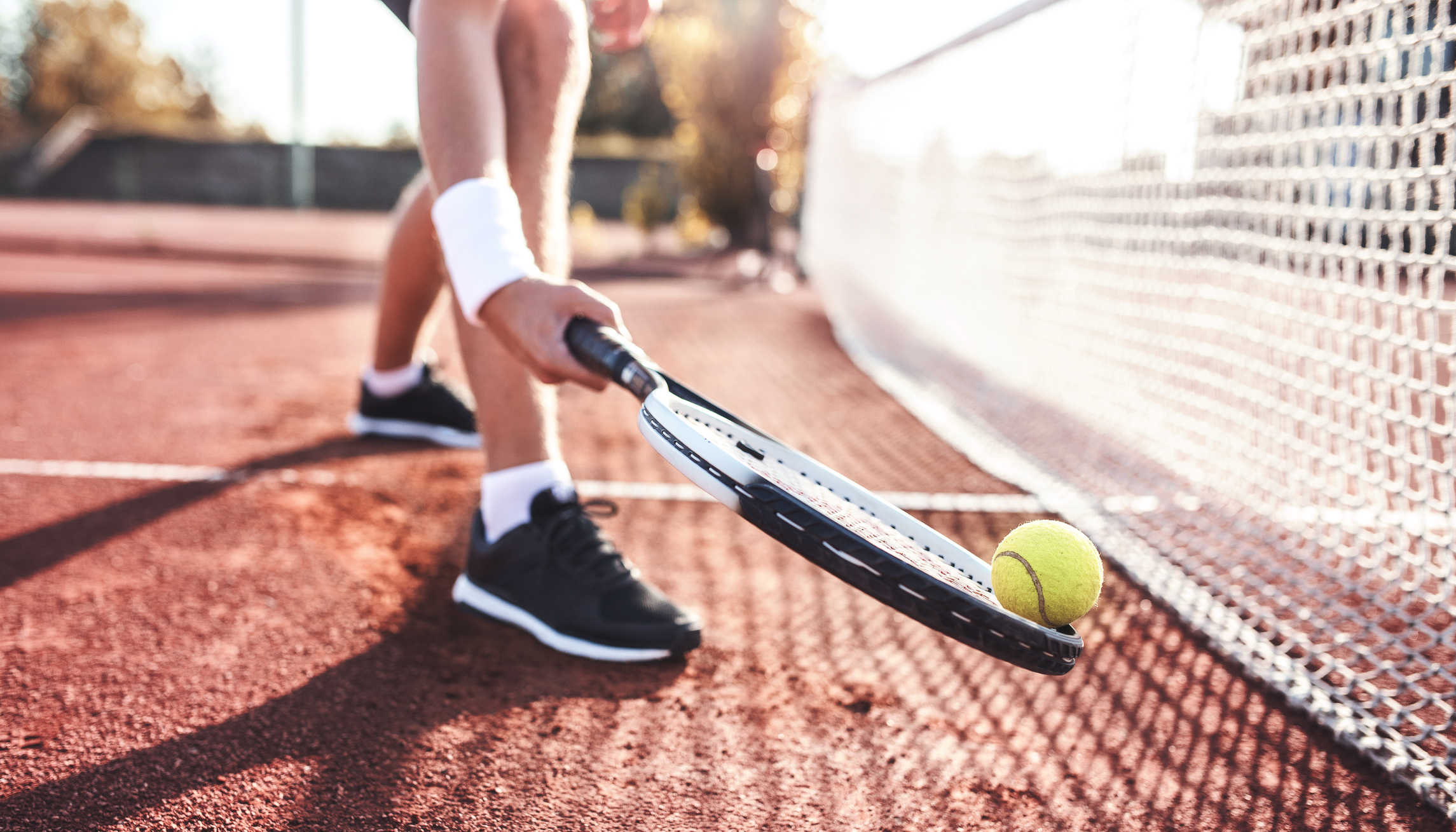 Learn to play tennis. Image credit: Bobex-73/iStock