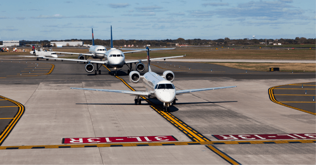 Planes waiting in line at JFK Airport. Image credit: huseyintuncer/iStock