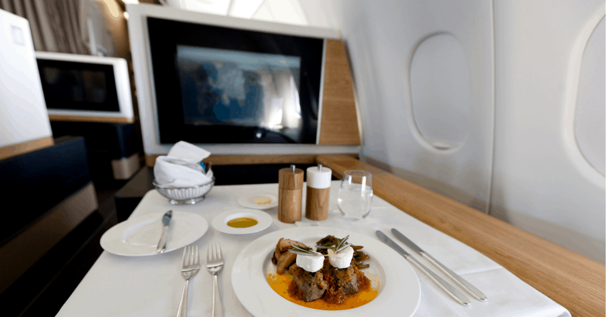 You can expect to enjoy a fine dining experience in first class. Image credit: Fabian Gysel/iStock