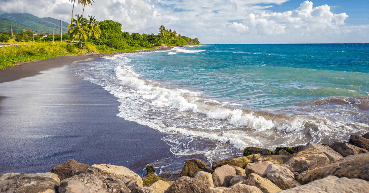 The black sands of St Kitts. Image credit: Nellmac/iStock