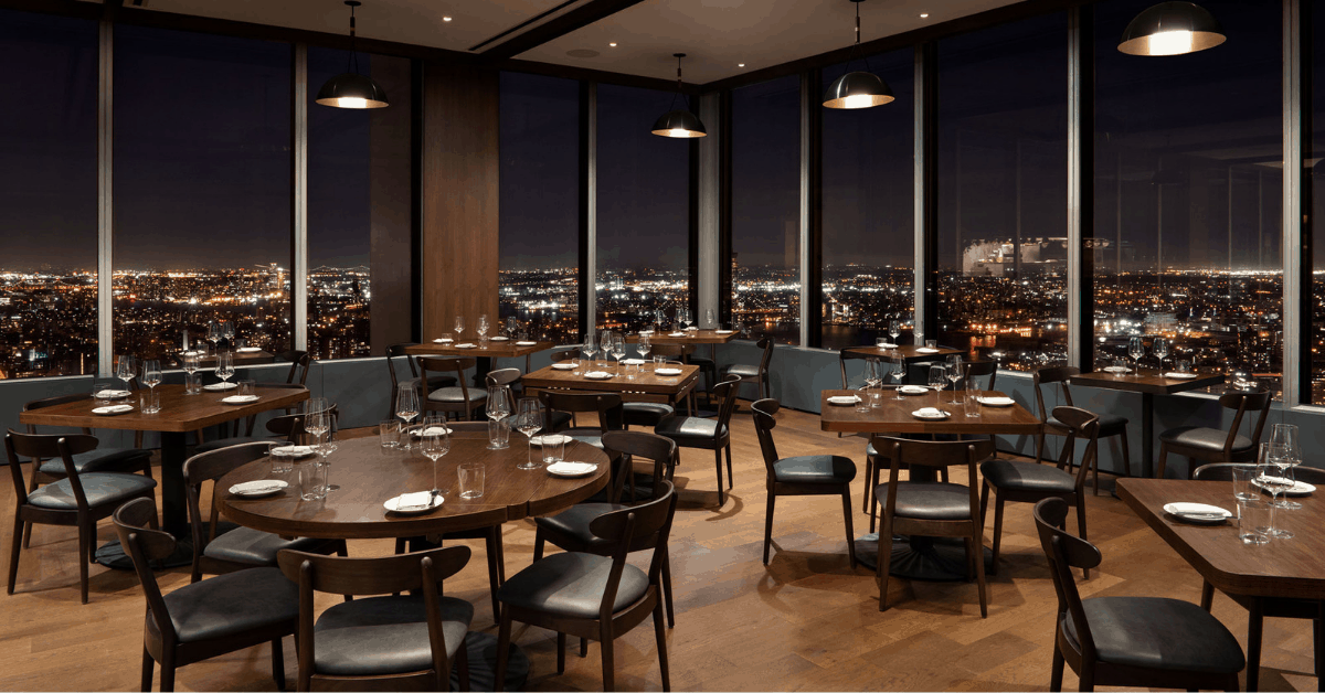 Soak up NYC's glittering skyline with dinner at Manhatta. Image credit: Emily Andrews