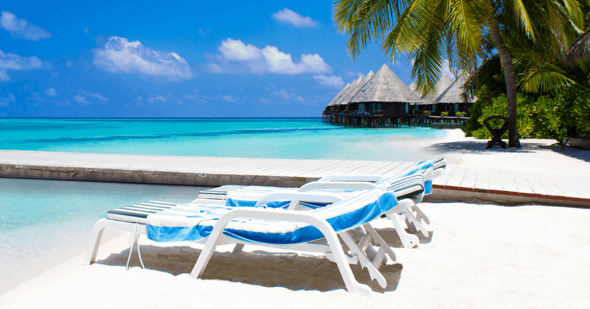 Lounge in a deckchair at Randheli Noonu Atoll,one of the best resorts in the Maldives. Image credit: AtanasBozhikovNasko/iStock