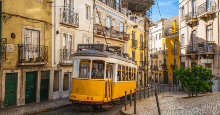 A tram weaves through the city of Lisbon. Image credit: Jui-Chi Chan/iStock