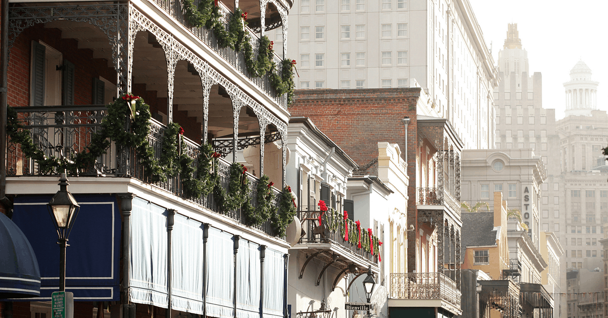 Wrought-iron balconies line Bourbon Street in New Orleans' French Quarter. Image credit: vectorarts/iStock