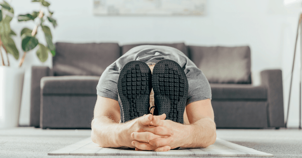 Stretch out your thoughts with some exercise at home. Image credit: LightFieldStudios/iStock