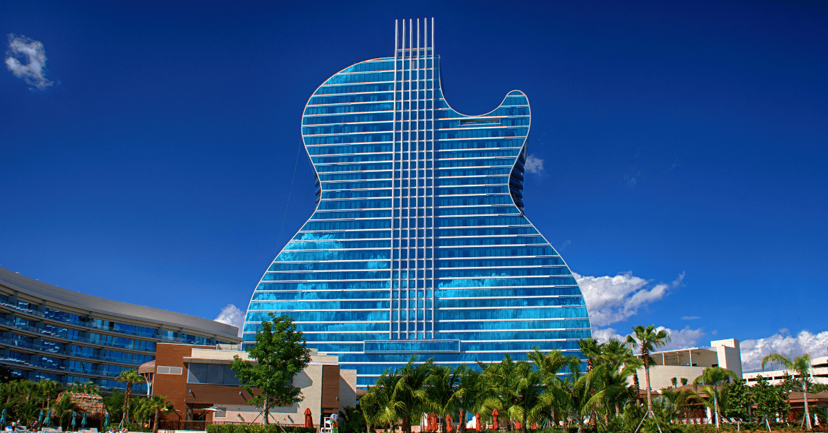 a building with a guitar shaped roof
