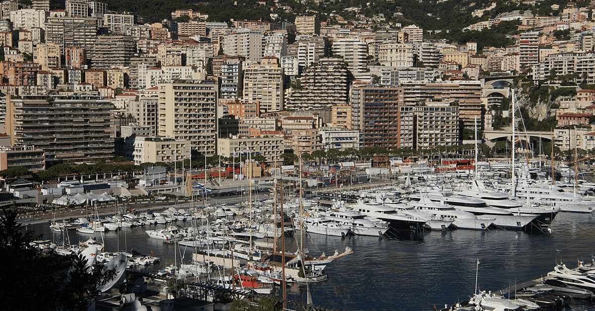 A bustling harbor filled with numerous docked boats, creating a picturesque scene of maritime activity.